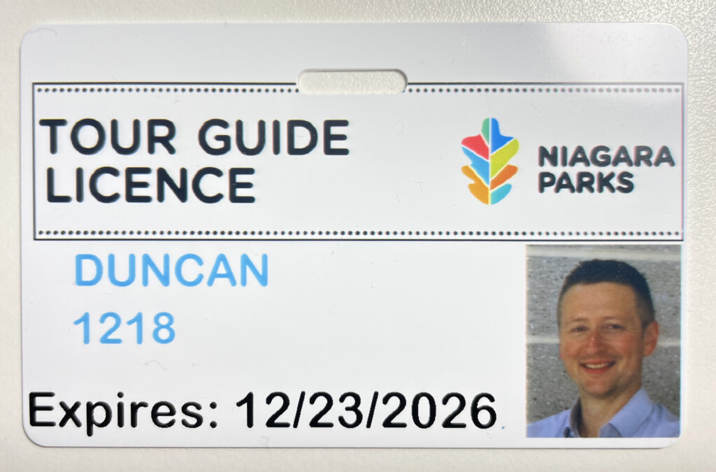 A tour guide license displaying the holder's name, photo, and certification details for guiding tours.